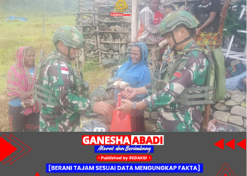 Pos Wuyuneri Satgas 715/Mtl Laksanakan Komsos dan Berbagi