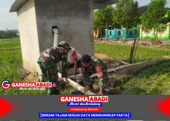 Babinsa Dampingi Petani dalam Pengairan Sawah