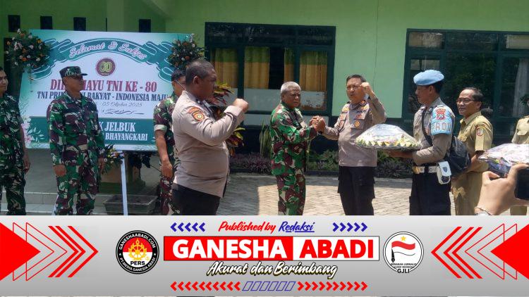 Polsek jelbuk Bawa Tumpeng Ulang Tahun untuk Koramil 0824/26 jelbuk di Momen HUT TNI ke-80