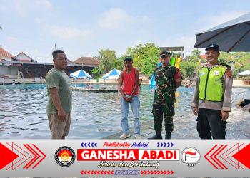 Babinsa dan Bhabinkamtibmas Amankan Obyek Wisata Umbul Tirta Lestari Selama Libur Nataru