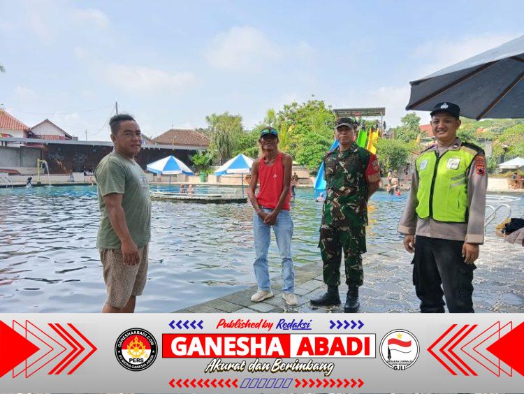 Babinsa dan Bhabinkamtibmas Amankan Obyek Wisata Umbul Tirta Lestari Selama Libur Nataru