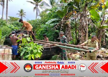 Personel TMMD Ke-127 Kodim 1514/Morotai Pasang Mesin Bor Air di Desa Falila