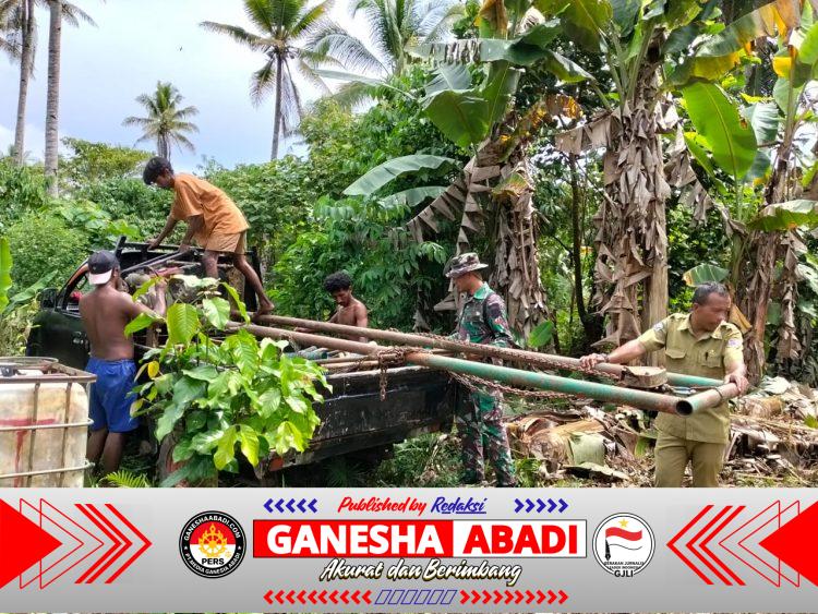 Personel TMMD Ke-127 Kodim 1514/Morotai Pasang Mesin Bor Air di Desa Falila