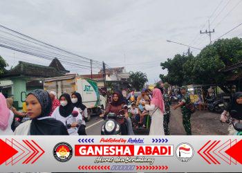 Anggota Koramil 0825/17 Muncar dan Persit KCK Ranting 18 Gelar Bagi Takjil dan Buka Bersama