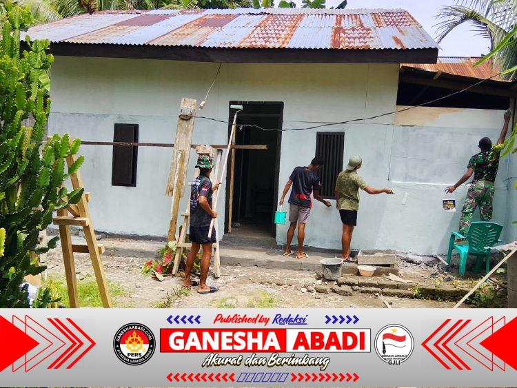 Personel TMMD Ke-127 Kodim 1514/Morotai Laksanakan Pengecatan RTLH di Desa Mandiri