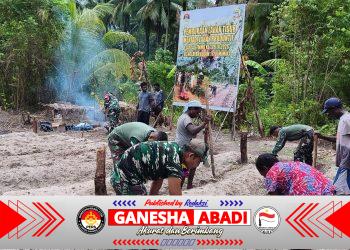 Manfaatkan Lahan Tidur, Satgas TMMD Ke-128 Kodim 1710/Mimika Tanam Jagung Bersama Warga