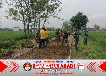 Kolaborasi Pasukan Kuning dengan Pasukan Loreng di TMMD Reg Ke-128 Kodim 0725/Sragen