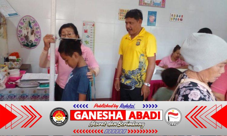 Bhabinkamtibmas Desa Dangin Puri Kaja Hadiri Kegiatan Posyandu dalam Upaya Pencegahan Stunting