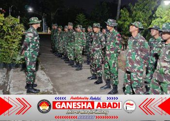 Jaga Kedisiplinan dan Evaluasi Kerja, Danramil 02/Karangmalang Pimpin Apel Malam Satgas TMMD ke-128 di Desa Puro