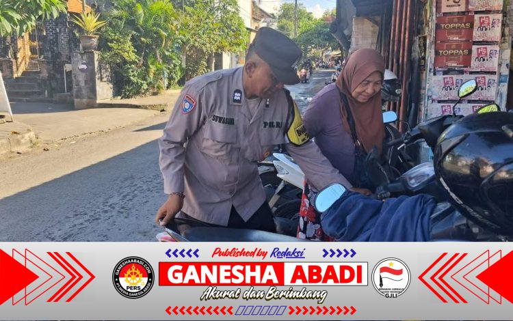 Bhabinkamtibmas Kelurahan Sanur Laksanakan Sambang Kamtibmas Humanis kepada Pedagang dan Pengunjung