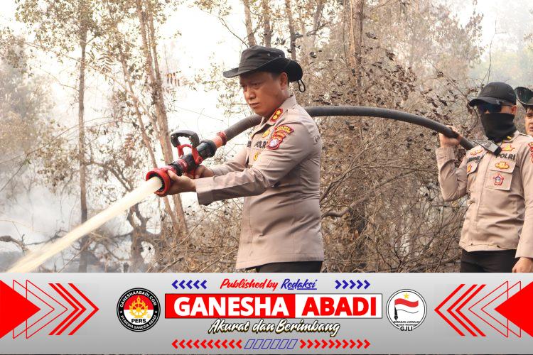 Respon Cepat Karhutla, Kapolres Barsel Padamkan Titik Api Di Masimpun Desa Kalahien