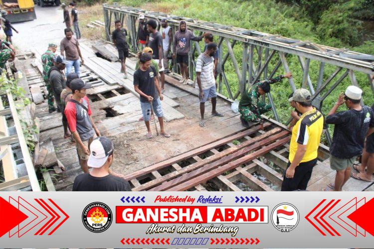 Sinergi TNI-Polri dan Masyarakat Perbaiki Jembatan Poros Lokpon-Dekai Sambut HUT ke-81 TNI