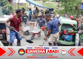 Kodim 1714/PJ Rampungkan Jembatan Beton Merah Putih Tahap VII di Kampung Kulok Enggame