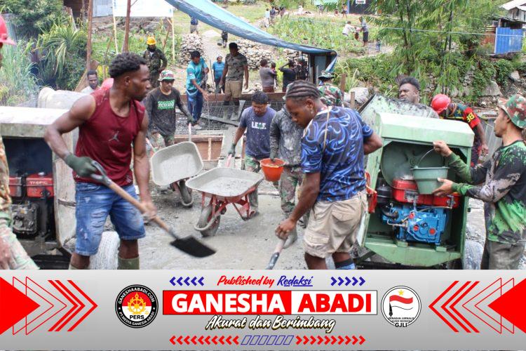 Kodim 1714/PJ Rampungkan Jembatan Beton Merah Putih Tahap VII di Kampung Kulok Enggame